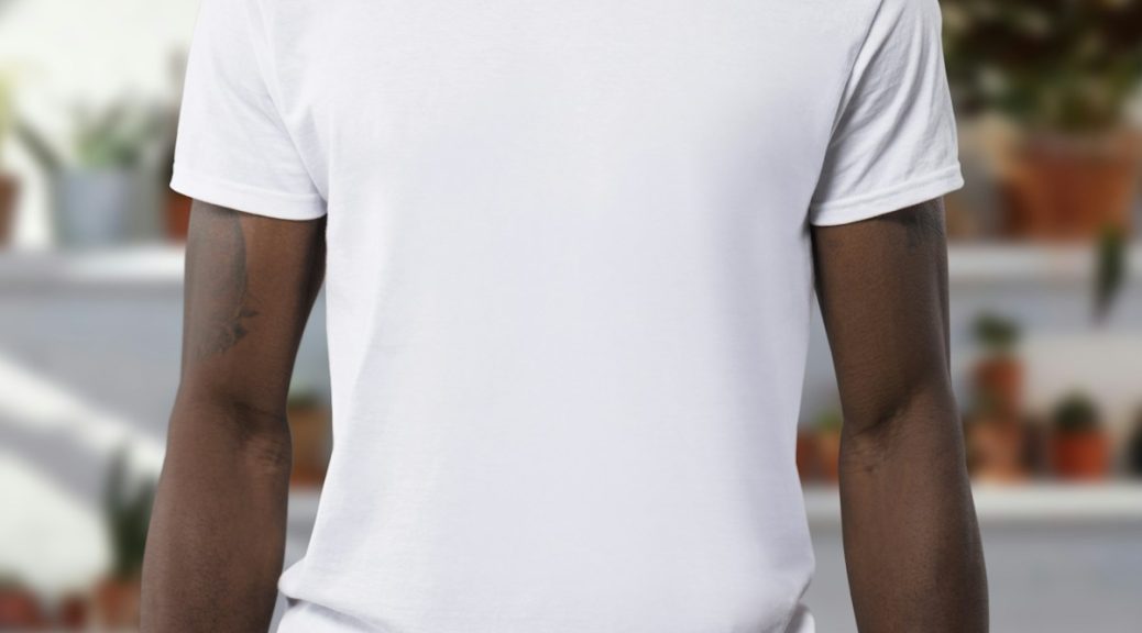 man wearing white crew-neck t-shirts